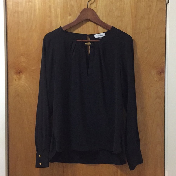 Calvin Klein Tops - Elegant black blouse with gold detailing